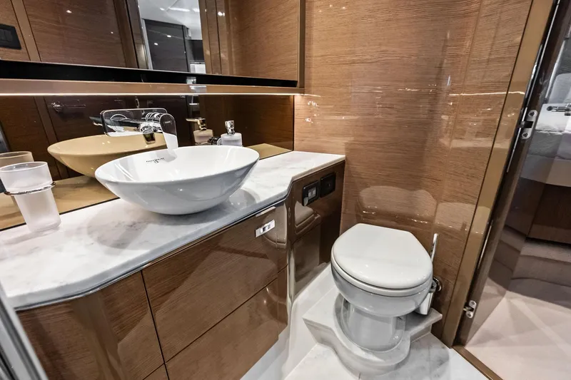 Slide: The Image of Luxurious bathroom in 2022 Princess 55 Flybridge yacht with modern fixtures and elegant design. - 37