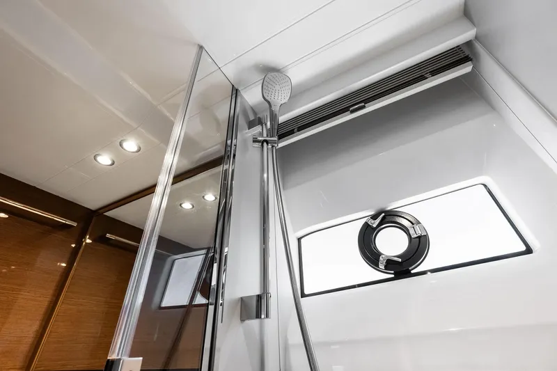 Slide: The Image of Luxurious bathroom interior of 2022 Princess 55 Flybridge yacht, featuring modern shower design. - 47
