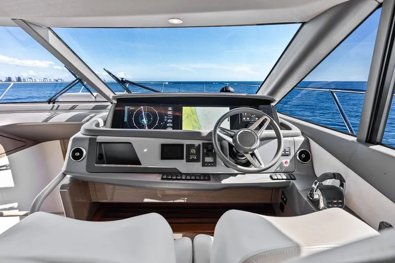 Slide: The Image of Modern helm of 2022 Princess 55 Flybridge yacht with ocean view. - 6