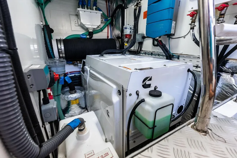 Slide: The Image of Engine room of 2022 Princess 55 Flybridge yacht with Cummins generator and wiring. - 70