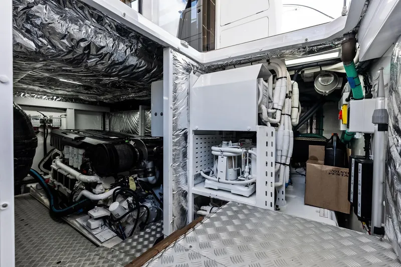 Slide: The Image of Engine room of 2022 Princess 55 Flybridge yacht, showcasing advanced machinery and equipment. - 71