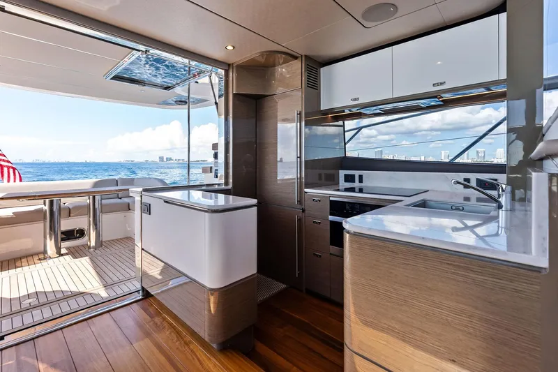 Slide: The Image of Luxurious interior of 2022 Princess 55 Flybridge yacht with modern kitchen and ocean view. - 73