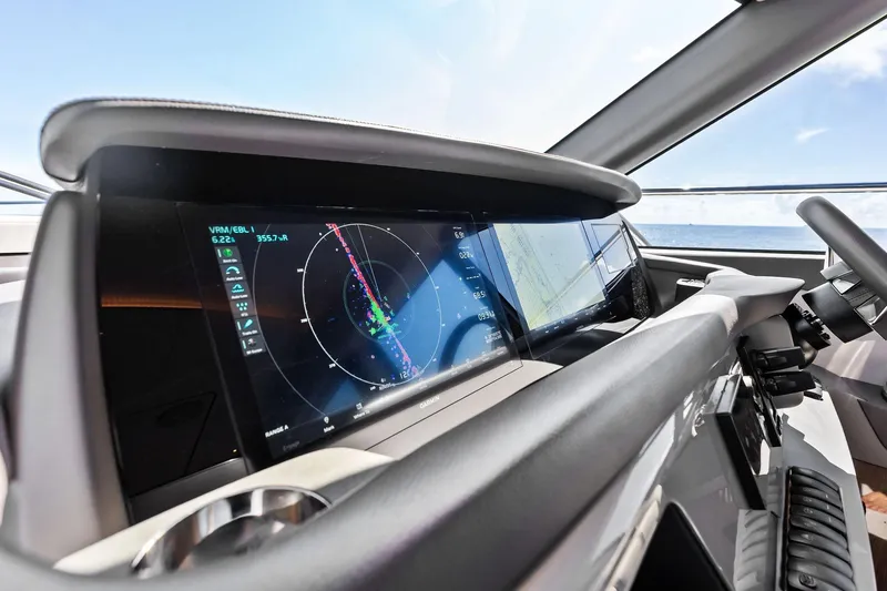 Slide: The Image of Helm of 2022 Princess 55 Flybridge yacht with advanced navigation display. - 9