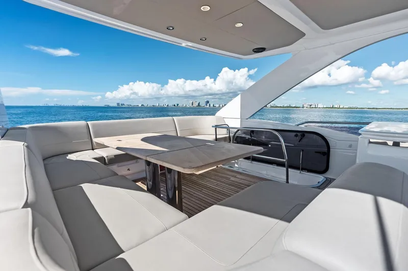 Slide: The Image of Luxurious seating area on 2022 Princess 55 Flybridge yacht with ocean view. - 92