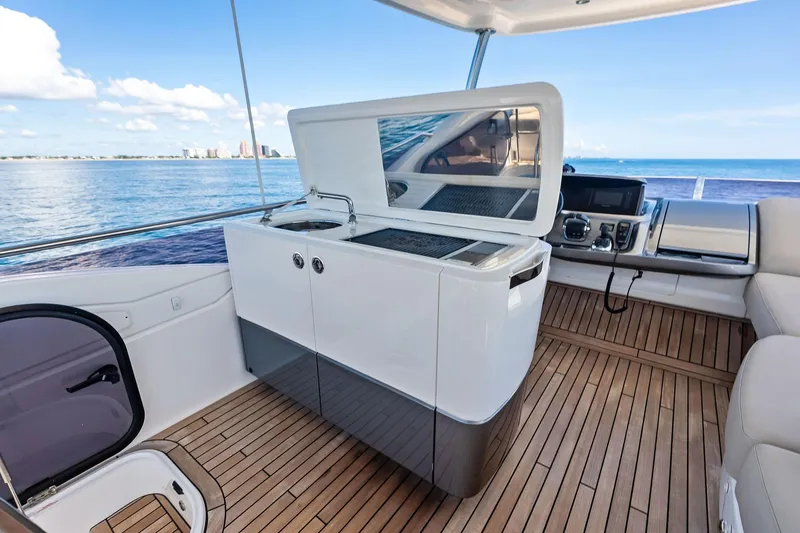 Slide: The Image of Luxurious 2022 Princess 55 flybridge yacht interior with modern amenities and ocean view. - 94