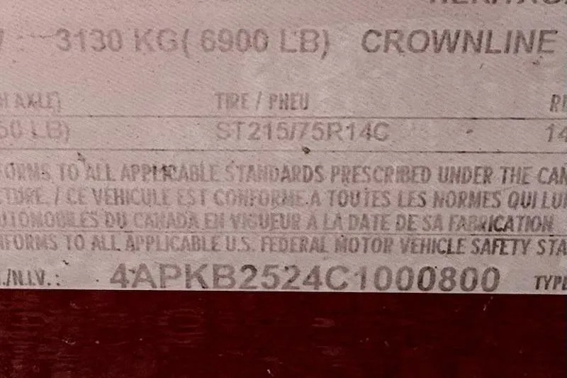 Slide: The Image of Label displaying specifications for 2012 Crownline Eclipse E2, including weight and tire information. - 14