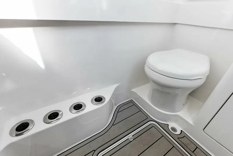 Slide: The Image of 2021 Valhalla Boatworks V-37 interior with modern marine toilet and sleek design. - 15