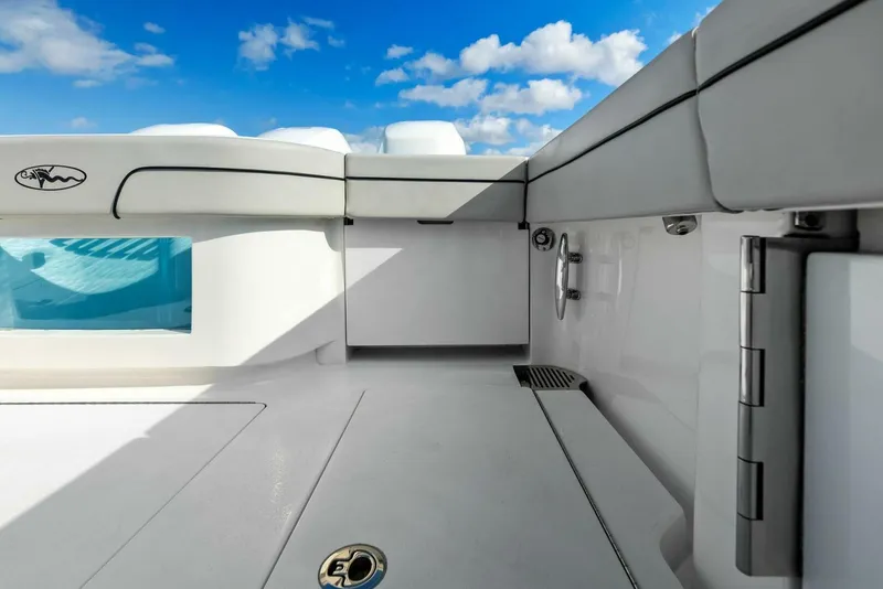 Slide: The Image of 2021 Valhalla Boatworks V-37 interior, showcasing sleek white design under a bright blue sky. - 26