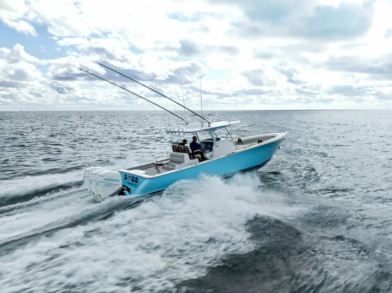 Slide: The Image of 2021 Valhalla Boatworks V-37 cruising on open water under cloudy skies. - 43