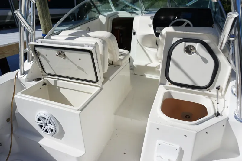Slide: The Image of 2008 Hydra-Sports Vector 2900 VX boat interior with open storage compartments. - 10