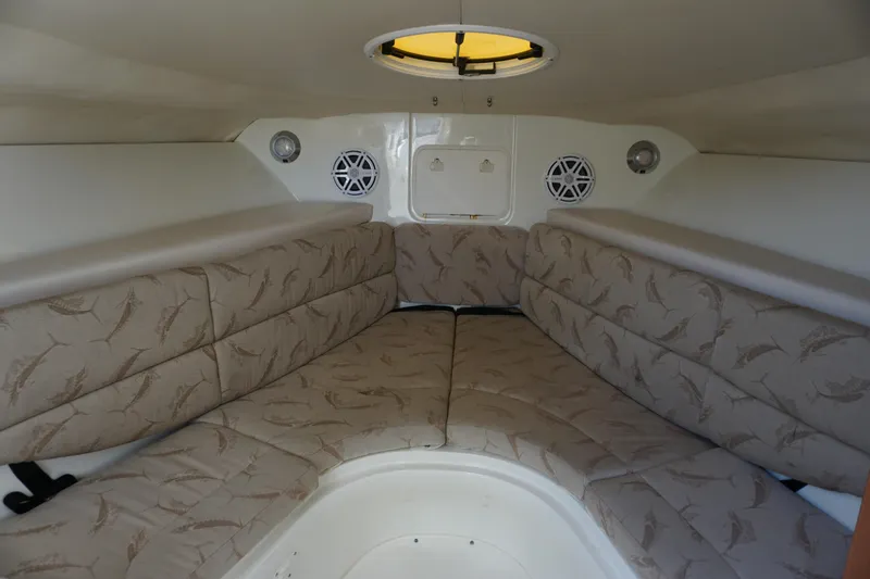 Slide: The Image of 2008 Hydra-Sports Vector 2900 VX cabin interior with cushioned seating and circular hatch. - 14