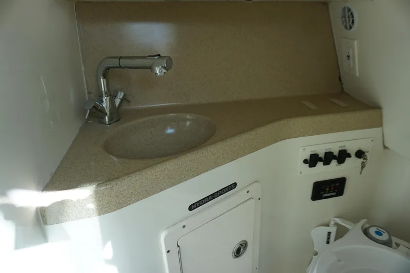 Slide: The Image of 2008 Hydra-Sports Vector 2900 VX cabin sink and control panel. - 20
