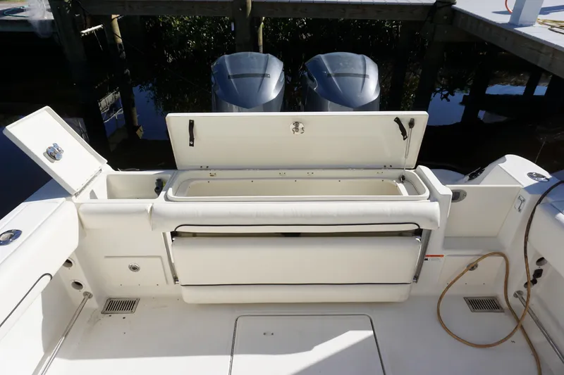 Slide: The Image of 2008 Hydra-Sports Vector 2900 VX boat interior with open storage compartments. - 5