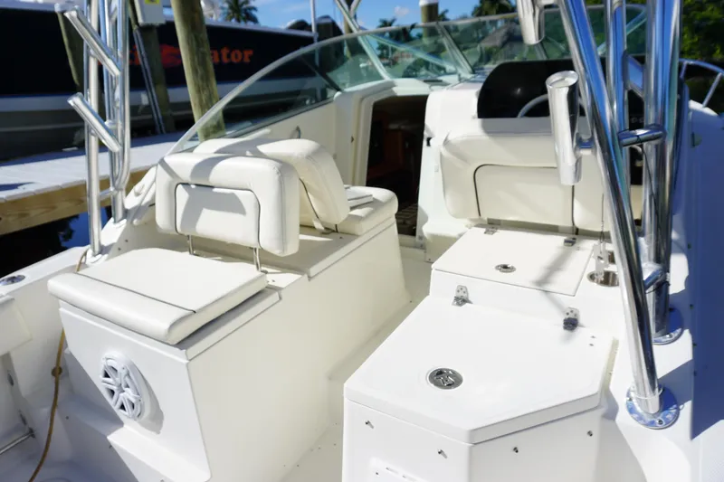 Slide: The Image of 2008 Hydra-Sports Vector 2900 VX boat interior with white seating and storage compartments. - 9