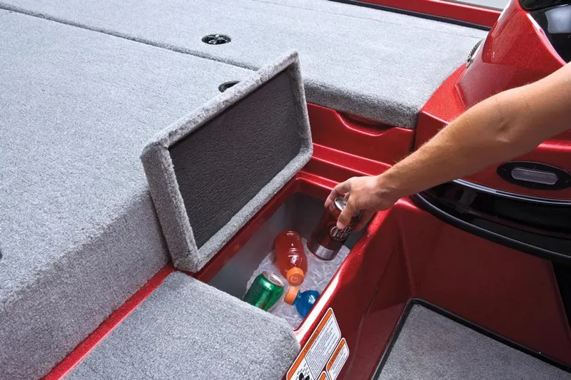 Slide: The Image of Manufacturer Provided Image: Person accessing storage compartment on 2013 Nitro Z-8 boat, storing drinks. - 19