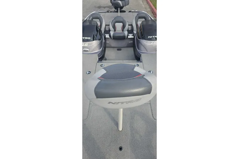 Slide: The Image of 2013 Nitro Z-8 boat interior with seating and console view. - 3