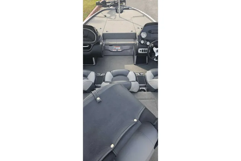 Slide: The Image of 2013 Nitro Z-8 boat interior with steering wheel and seating. - 4