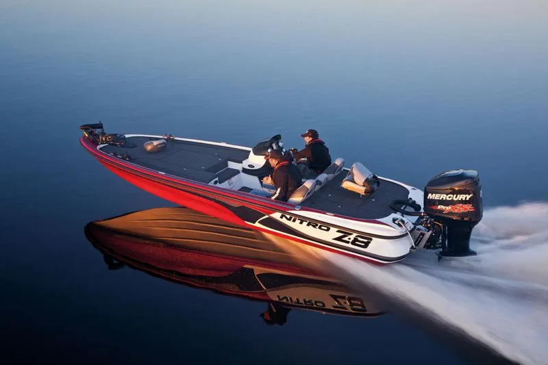 Slide: The Image of Manufacturer Provided Image: 2013 Nitro Z-8 boat speeding on calm water with Mercury engine. - 6