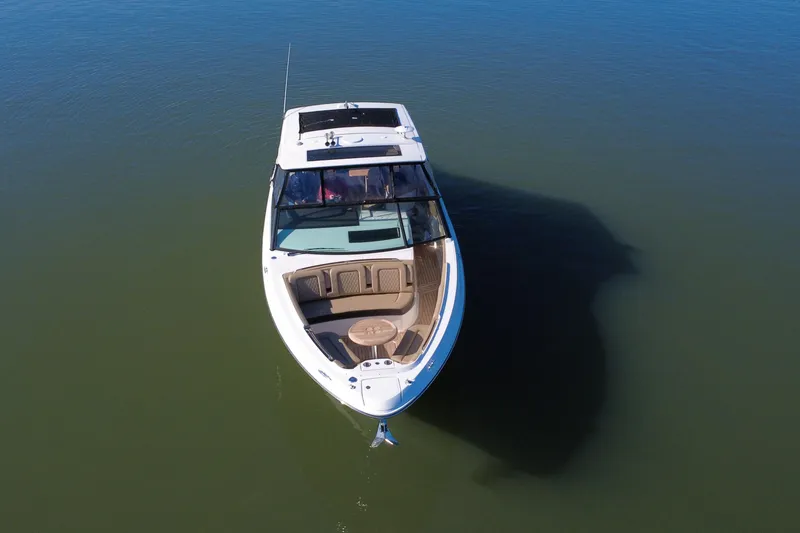 Slide: The Image of 2022 Sea Ray SLX 400 boat on calm water, aerial view. - 25