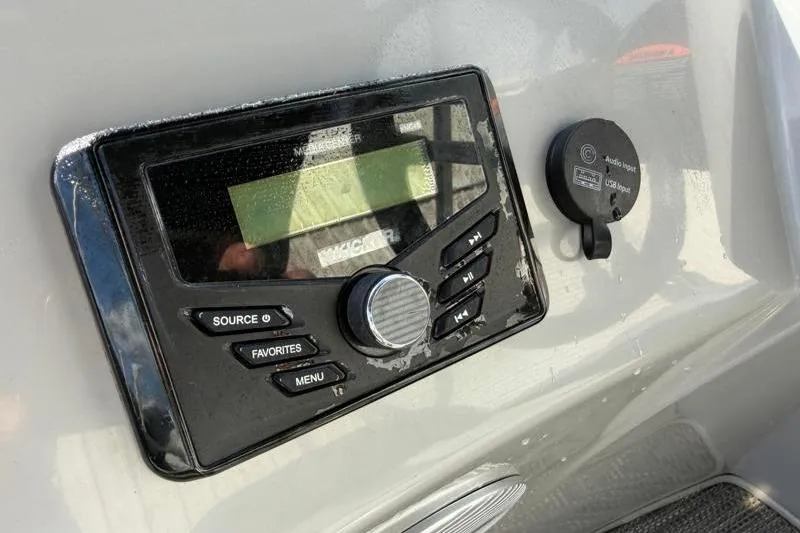 Slide: The Image of Control panel of 2023 Bennington 22SSR boat with audio input and USB port. - 21