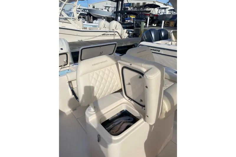 Slide: The Image of 2025 Grady-White Fisherman 236 boat interior with seating and rod holders. - 16