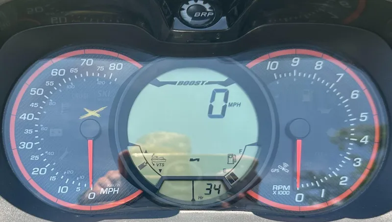 Slide: The Image of Dashboard of a 2015 Sea-Doo RXT260 showing speed and RPM gauges. - 14
