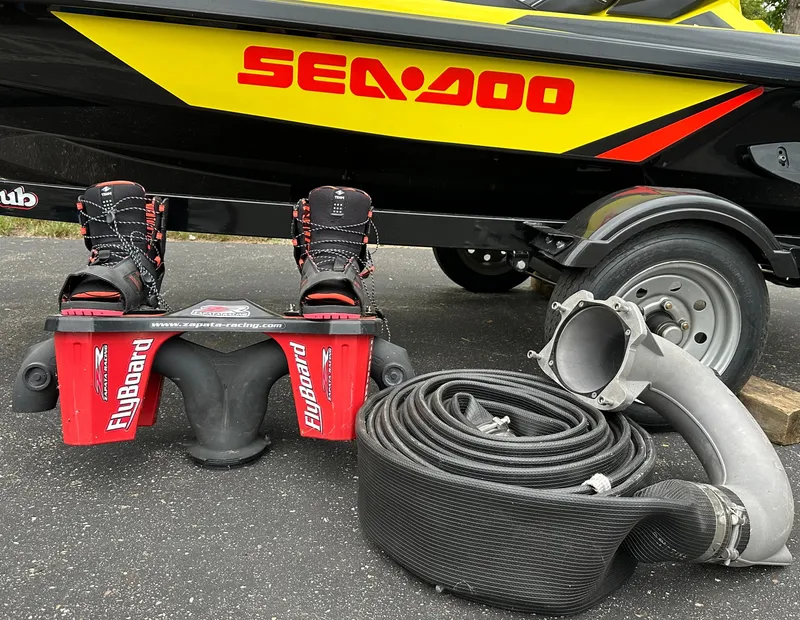 Slide: The Image of 2015 Sea-Doo RXT260 with Flyboard equipment and hose on pavement. - 15