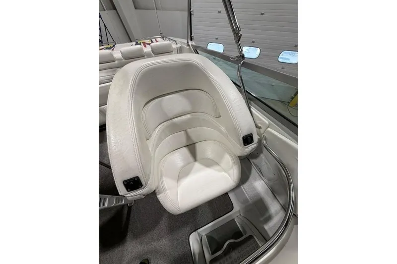 Slide: The Image of White leather seat in 1998 Formula 382 FASTech boat interior. - 27
