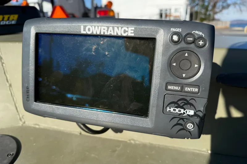 Slide: The Image of Lowrance Hook 7 fish finder on 2014 Lowe Roughneck 1650 DLX boat. - 10