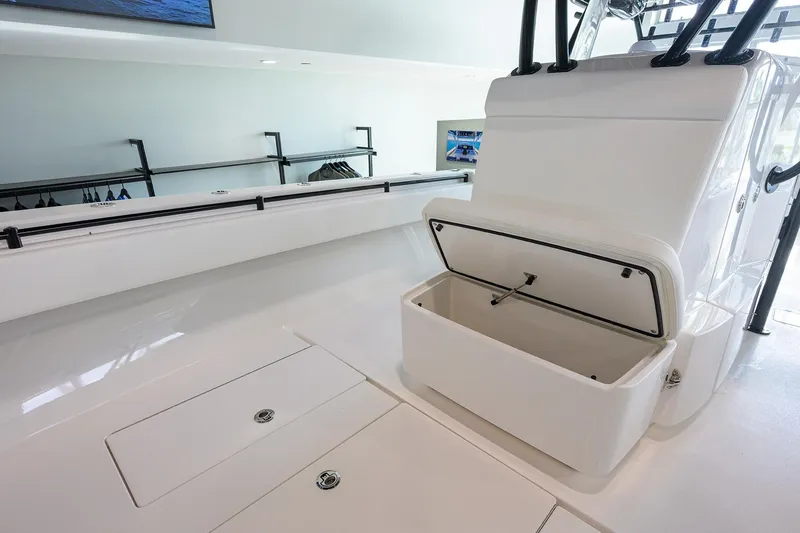 Slide: The Image of 2026 Contender 39 ST boat interior with open storage compartment. - 19