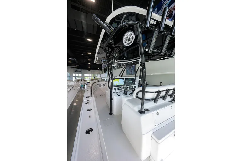 Slide: The Image of 2026 Contender 39 ST boat interior with advanced navigation system and sleek design. - 5