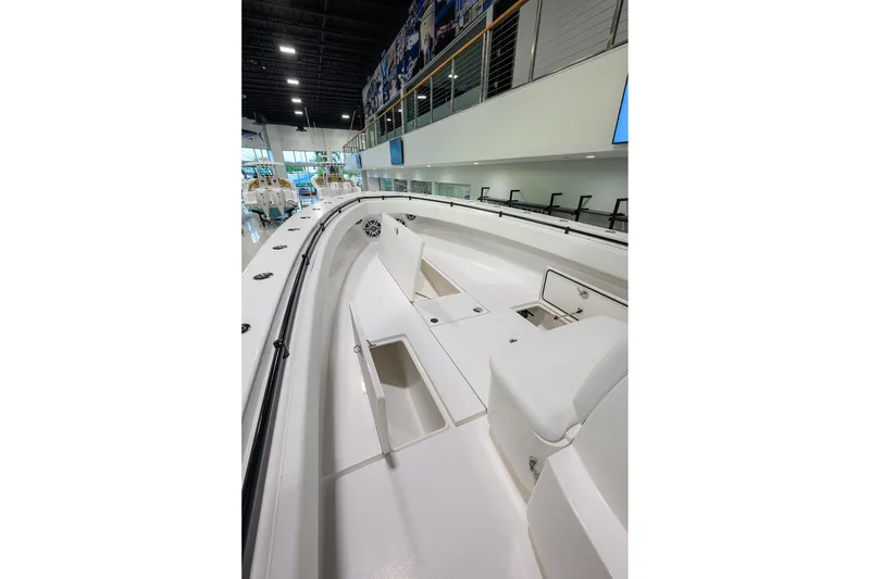 Slide: The Image of 2026 Contender 39 ST boat interior with spacious seating and storage compartments. - 8