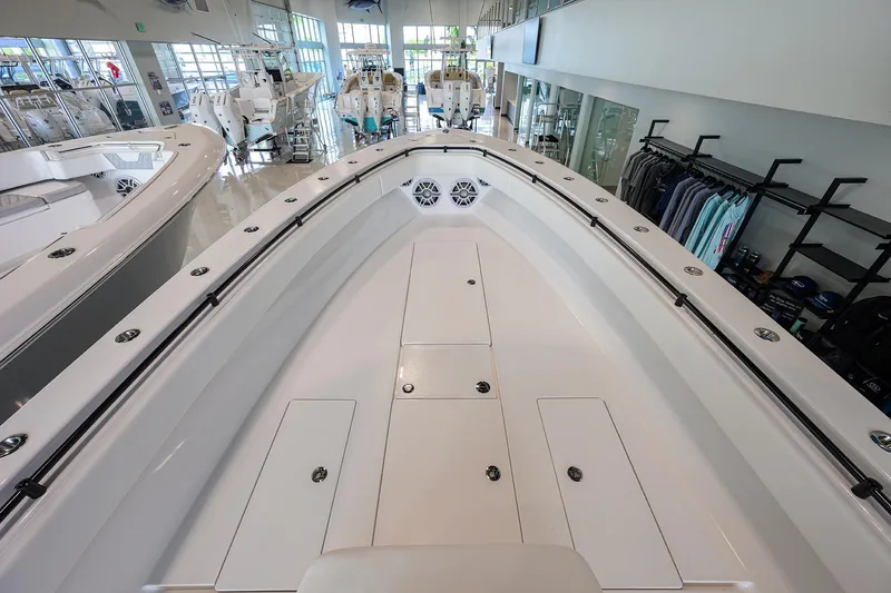 Slide: The Image of 2026 Contender 39 ST boat interior in showroom, showcasing sleek design and spacious layout. - 9