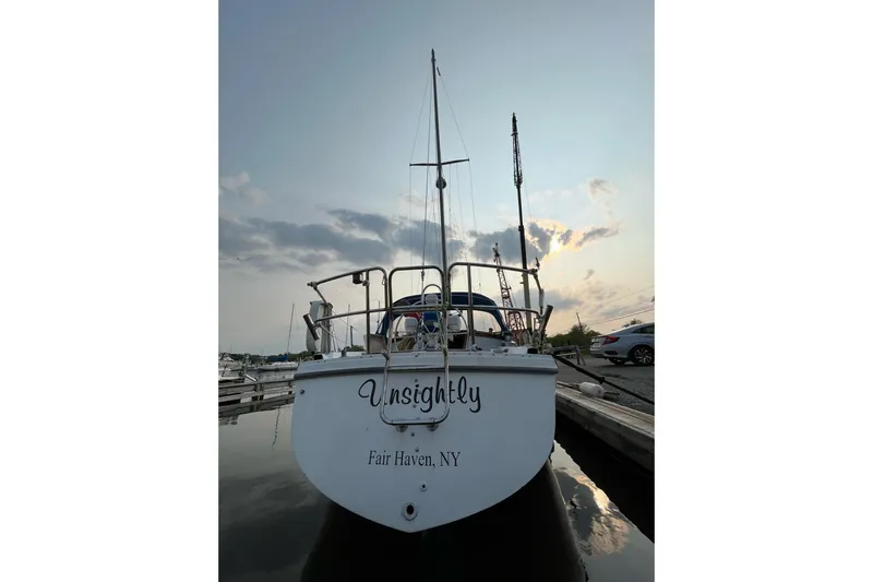 Slide: The Image of Catalina 36 sailboat from 1985 docked at sunset in Fair Haven, NY. - 15