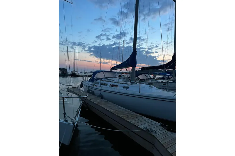 Slide: The Image of Catalina 36 sailboat docked at sunset, 1985 model, serene marina view. - 20
