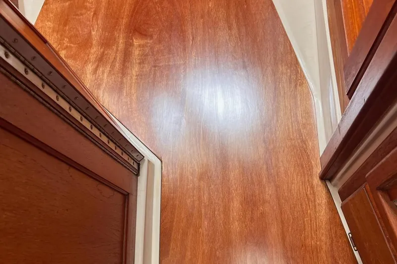 Slide: The Image of Wood interior of a 1985 Catalina 36 boat. - 40