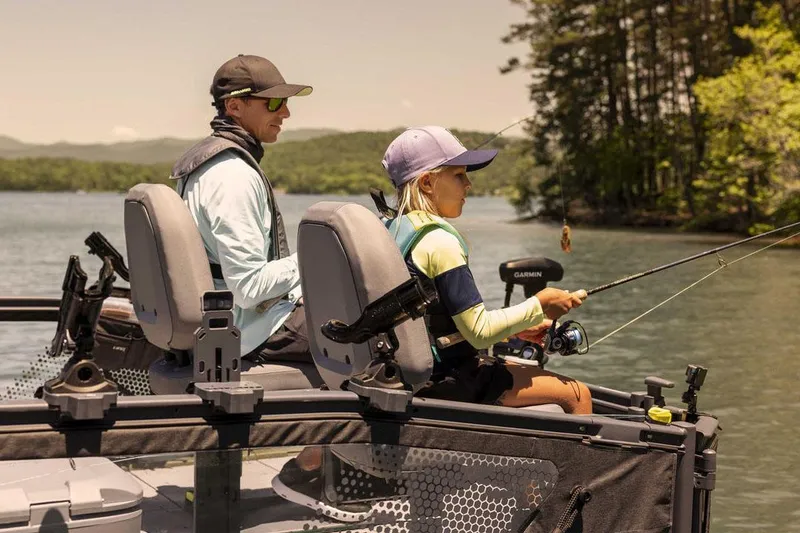 Slide: The Image of Manufacturer Provided Image: Two people fishing on a 2026 Sea-Doo Switch Fish 18 boat. - 3