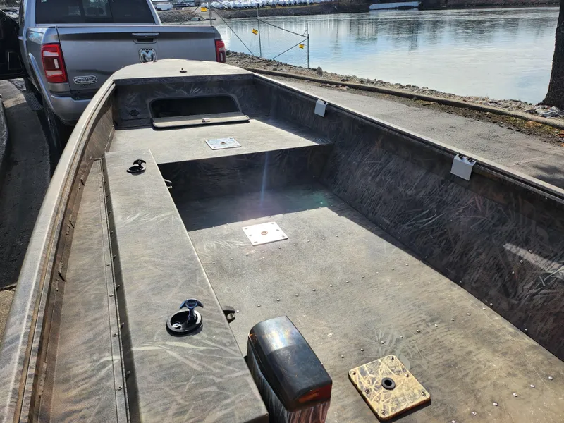 Slide: The Image of 2019 G3 Gator Tough 15 DK boat on trailer by waterfront. - 10