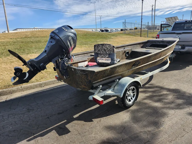Slide: The Image of 2019 G3 Gator Tough 15 DK boat on trailer with outboard motor. - 3