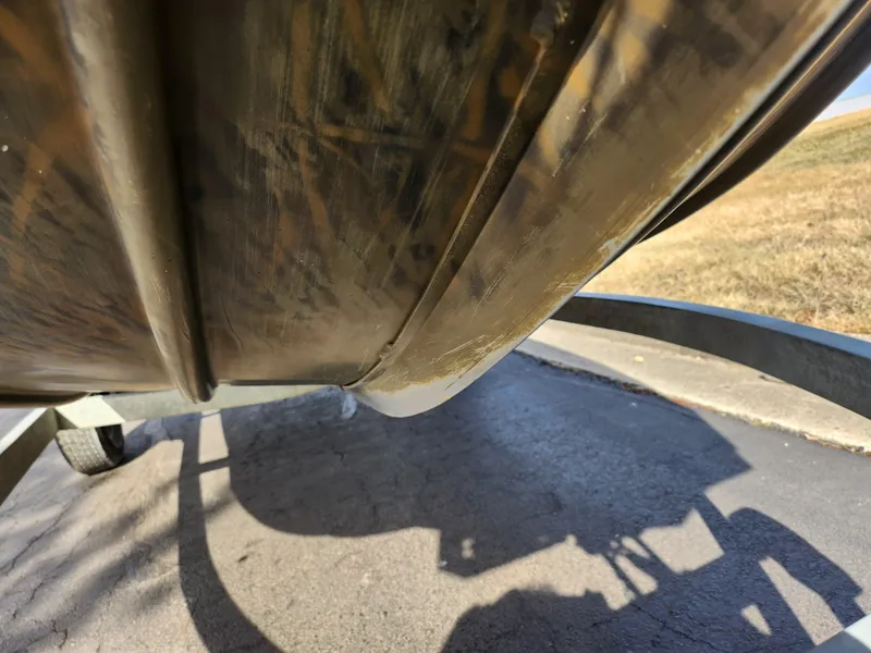 Slide: The Image of Close-up of 2019 G3 Gator Tough 15 DK boat hull on trailer. - 7