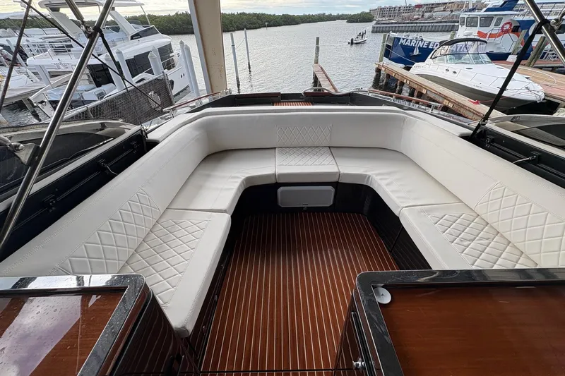 Slide: The Image of Luxurious seating area on a 2017 Riva 38' Rivamare yacht at a marina. - 11
