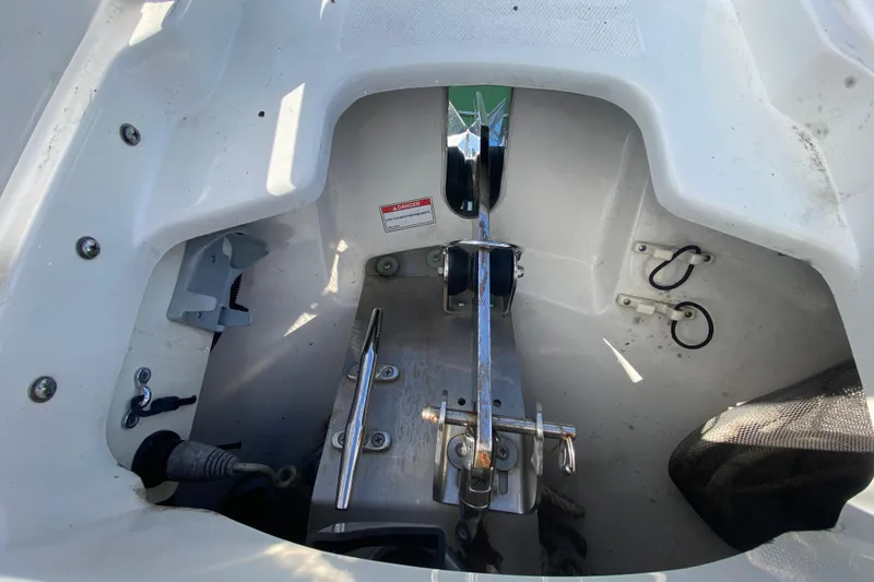 Slide: The Image of Anchor compartment of 2019 Boston Whaler 270 Vantage boat, featuring stainless steel fittings. - 42