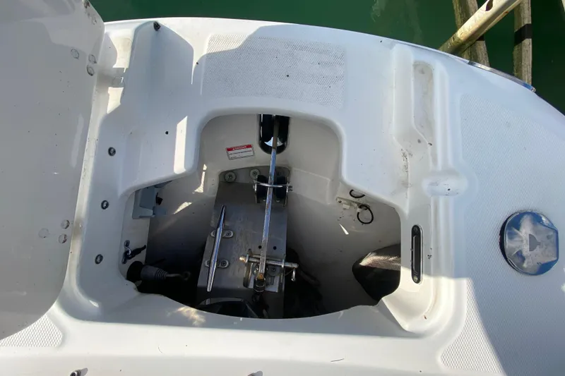 Slide: The Image of 2019 Boston Whaler 270 Vantage anchor compartment, showcasing clean design and functionality. - 43