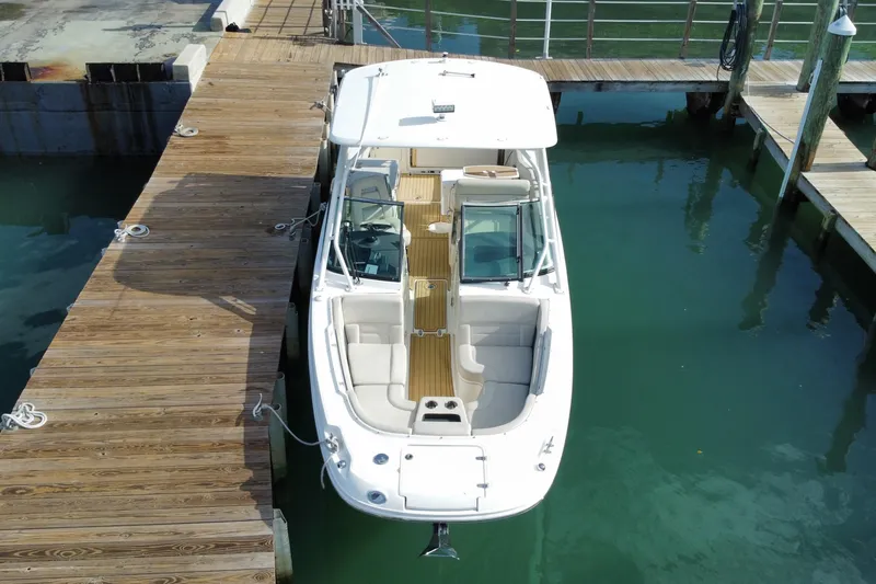 Slide: The Image of 2019 Boston Whaler 270 Vantage docked at marina, aerial view. - 5
