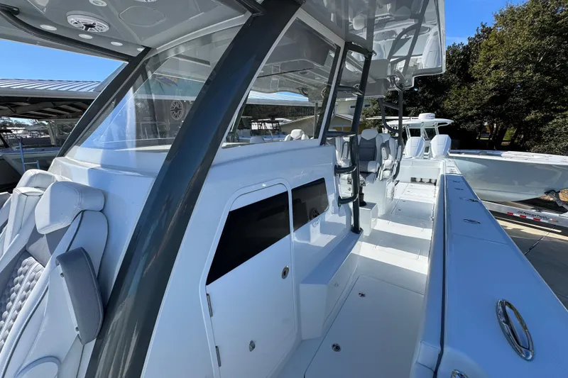 Slide: The Image of 2026 Invincible 46 Catamaran with sleek design and spacious deck layout. - 23