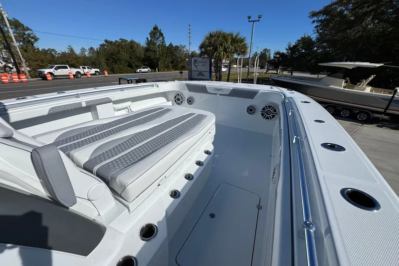 Slide: The Image of Luxurious 2026 Invincible 46 Catamaran with spacious seating and sleek design. - 25