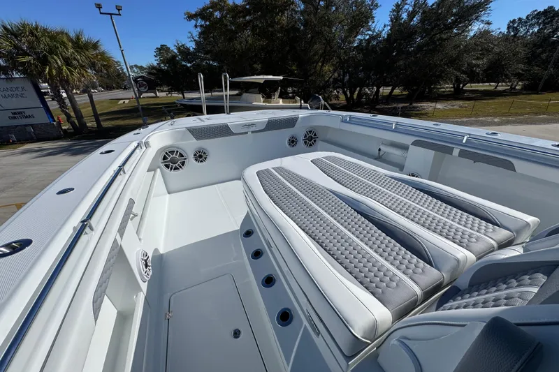 Slide: The Image of Invincible 46 Catamaran 2026 model with spacious deck and cushioned seating. - 27