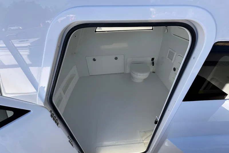 Slide: The Image of Interior view of 2026 Invincible 46 Catamaran bathroom with modern design. - 28