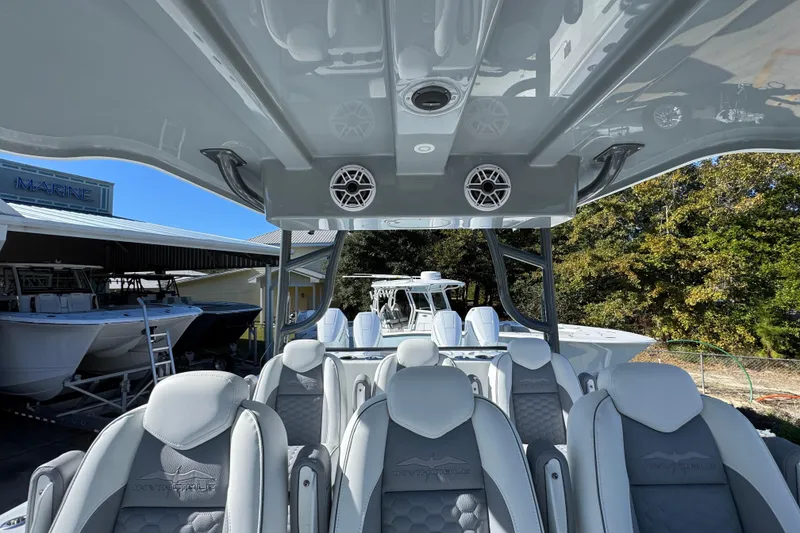 Slide: The Image of Interior view of 2026 Invincible 46 Catamaran with luxurious seating and modern design. - 33