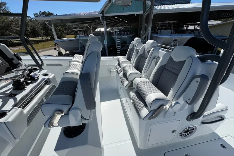 Slide: The Image of 2026 Invincible 46 Catamaran interior with luxurious seating and modern helm controls. - 40